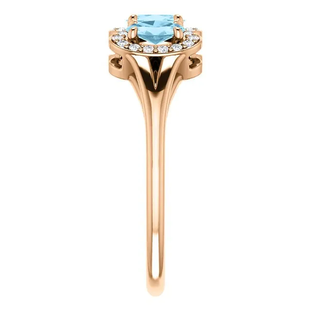 14KT GOLD .60 CTW AQUAMARINE & .16 CTW DIAMOND 3 STONE HALO RING