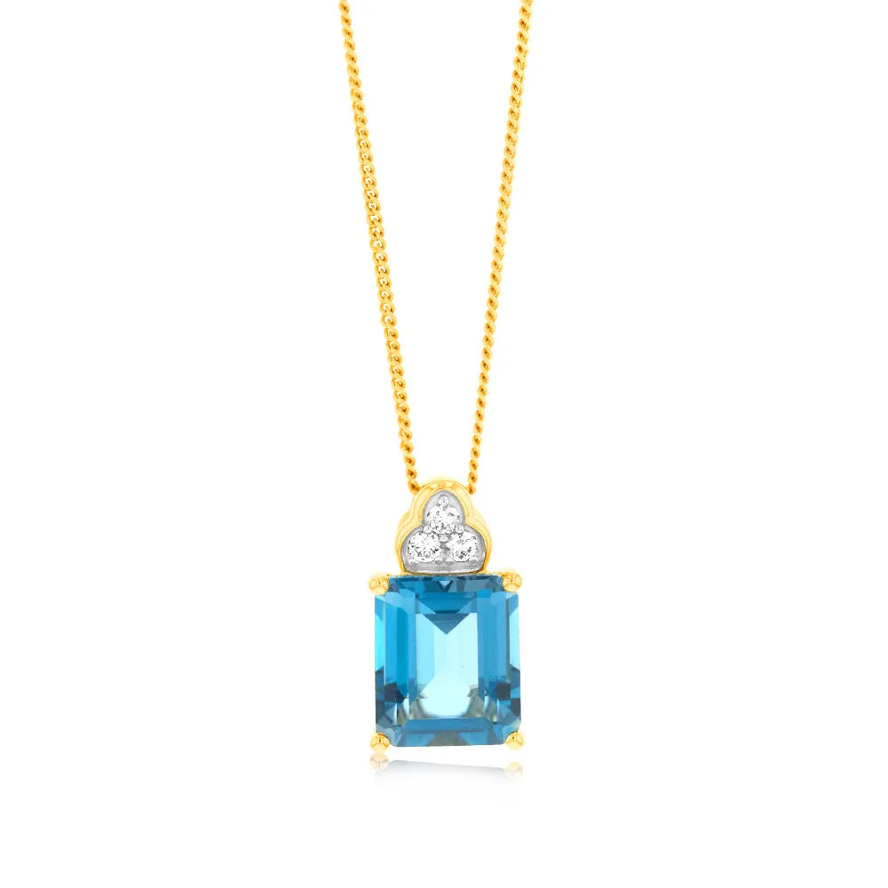 5.6Ct London Blue Topaz in 11x9mm Emerald Cut & 1/10Carat Diamond Pendant in 9ct Yellow White Gold