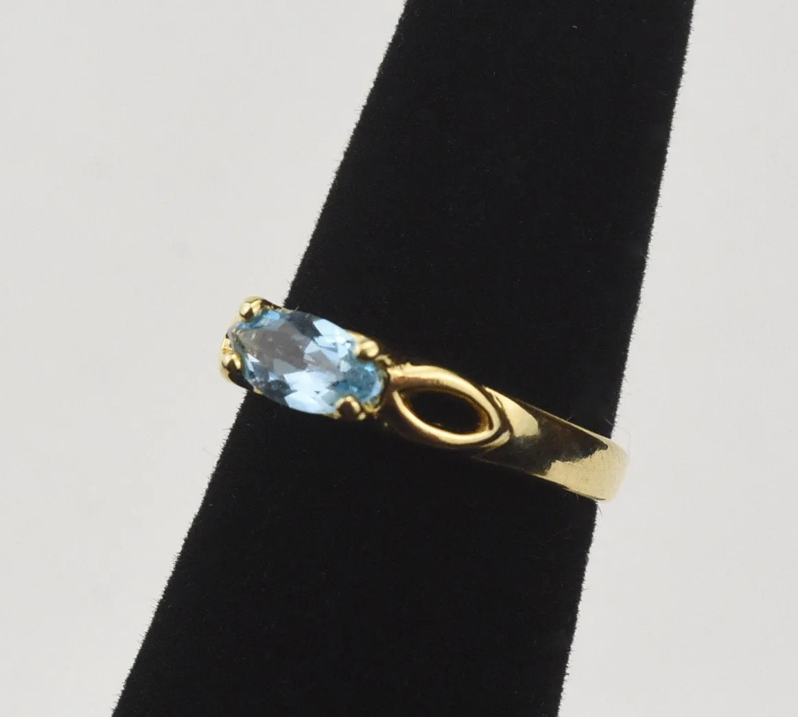 Gold Tone Sterling Silver Ring with Marquise Cut Light Blue Stone - Size 5