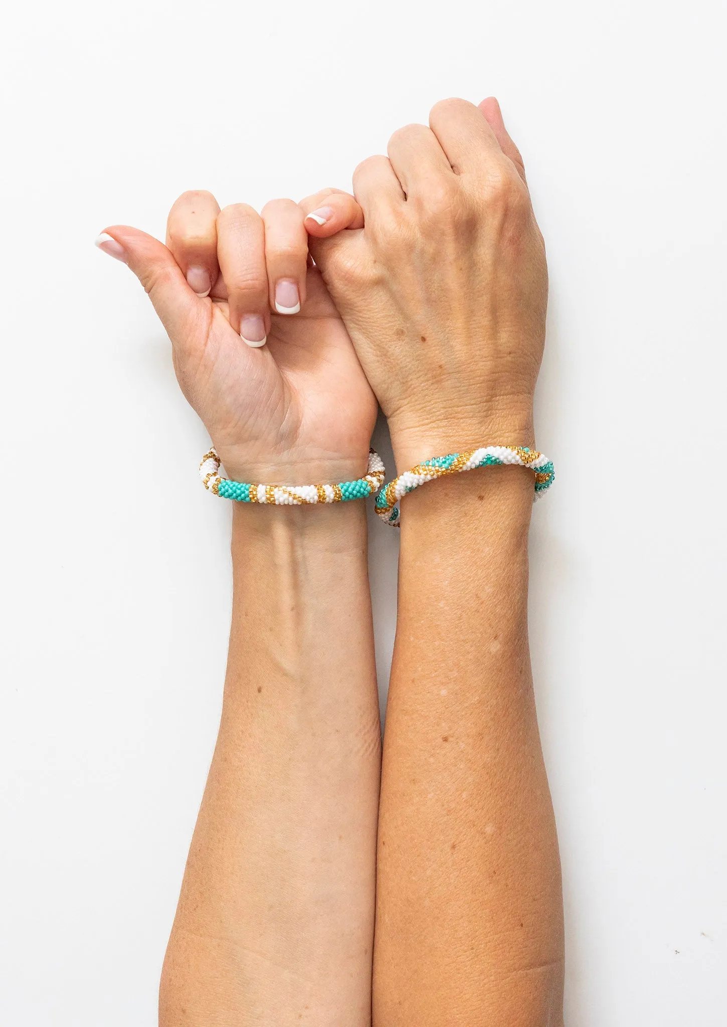 Roll-On® Friendship Bracelets <br> Aquamarine